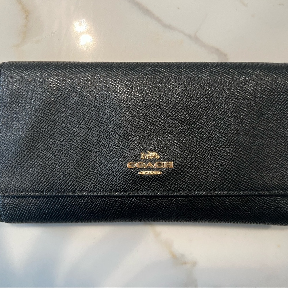 Black coach large wallet. Great condition lightly used.